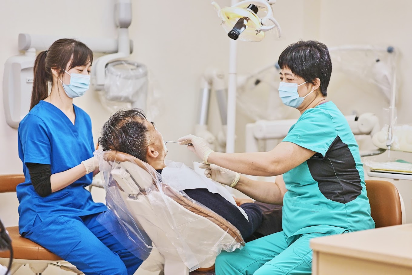 Dr. Wang providing gentle patient care